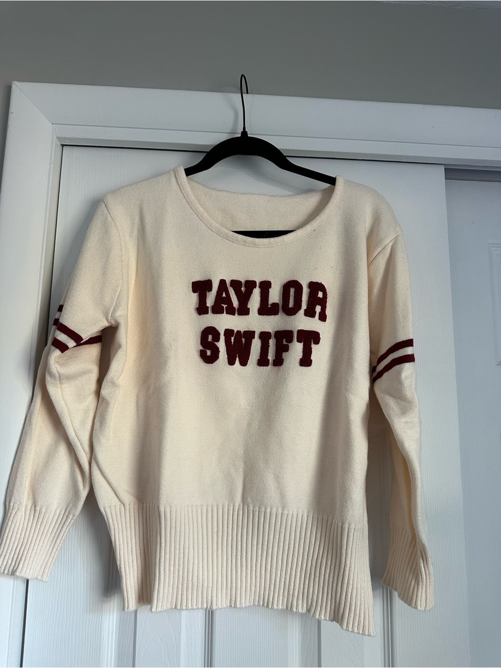 Taylor Swift Cream Sweater with Burgundy Lettering and Stripes